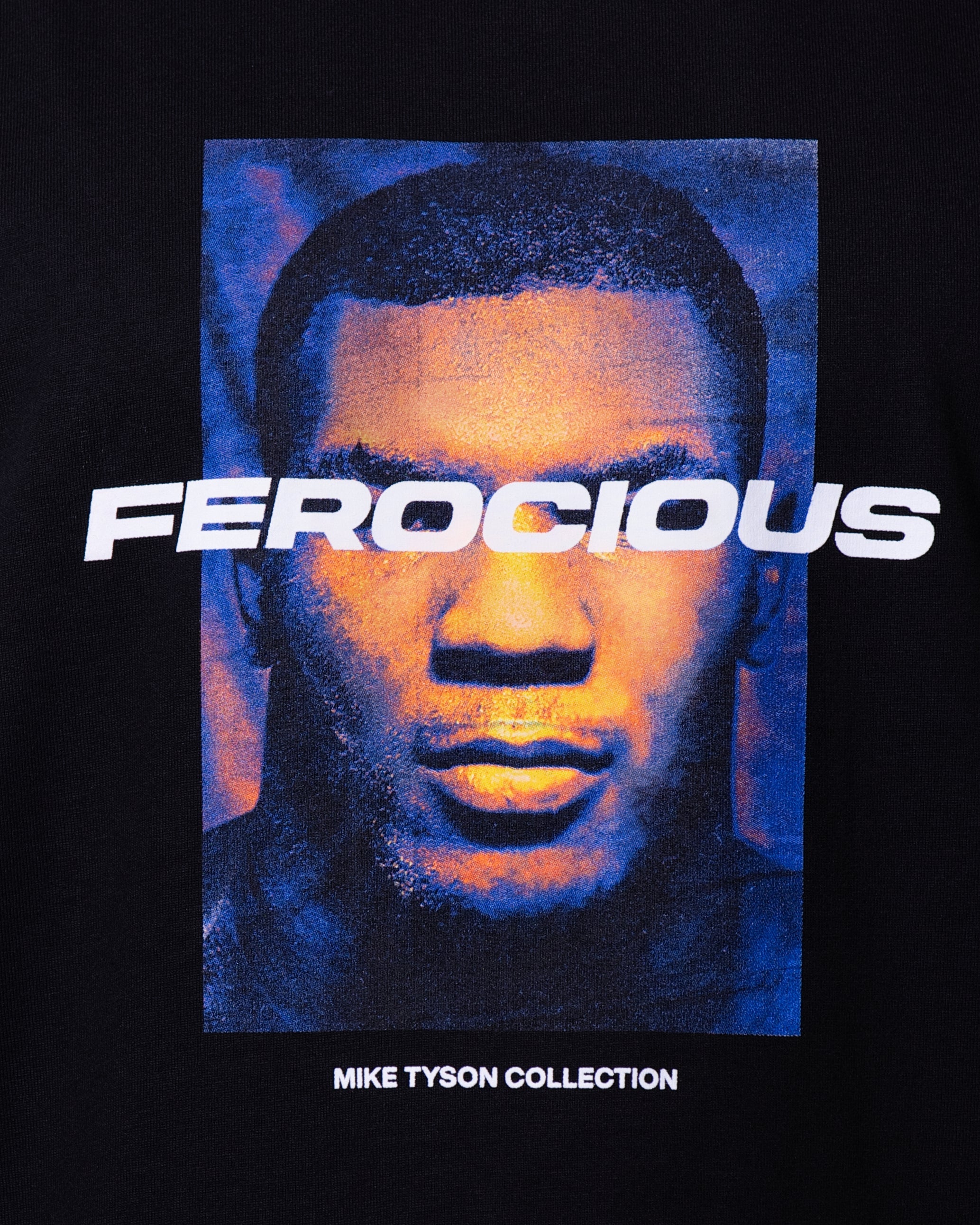 Black T-shirt with a focused Mike Tyson looking towards the viewer. Ferocious text goes across his eyes.