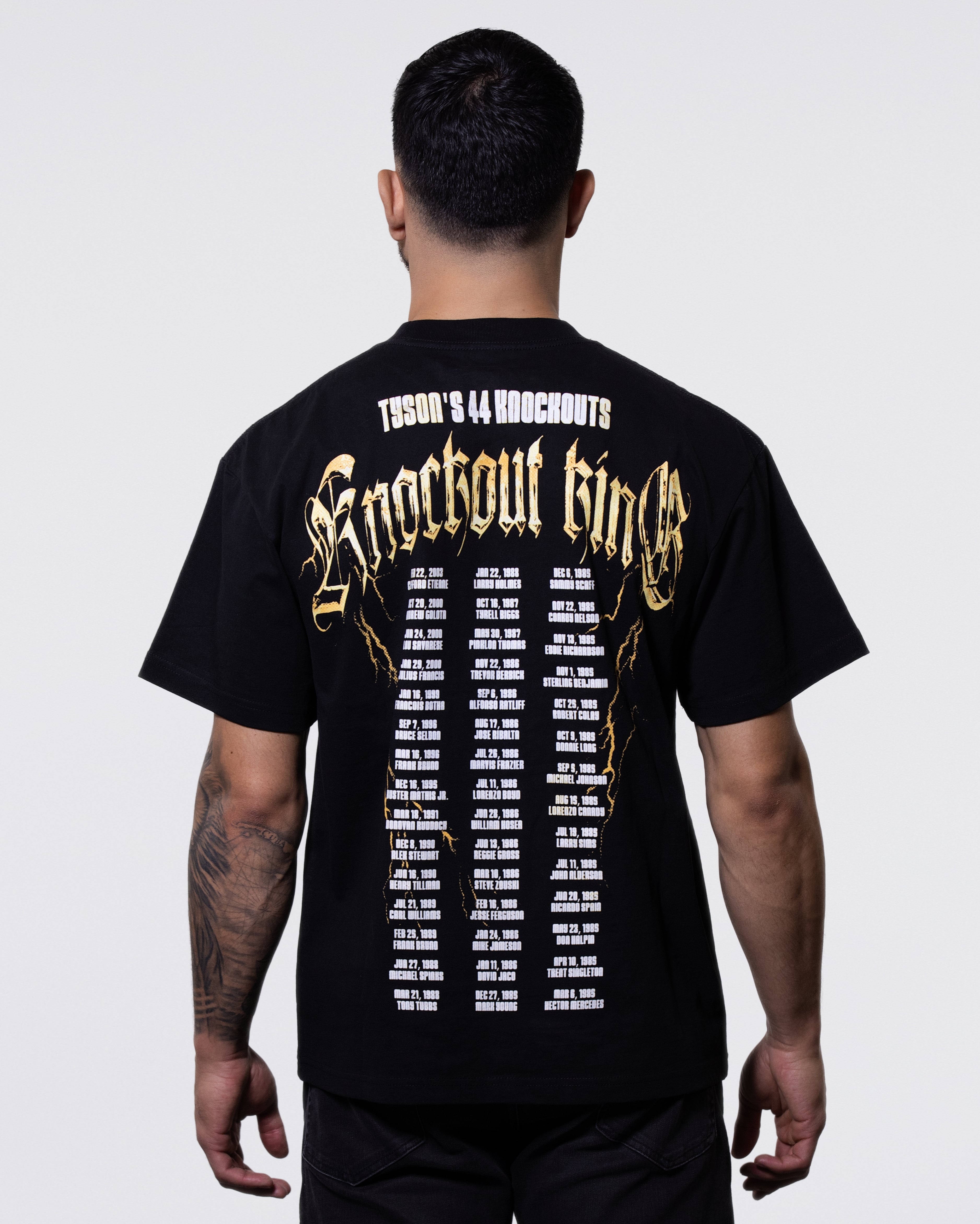Model showing the back of the Forty 4 tee.