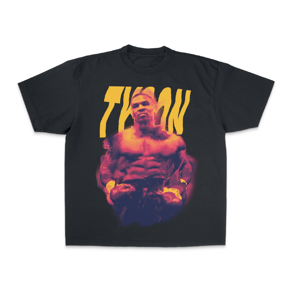 Black T-shirt with a fierce image of Mike, ready to fight. The image has red and blue highlights reminiscent of a mirage in the desert. "Tyson" is written behind the image.