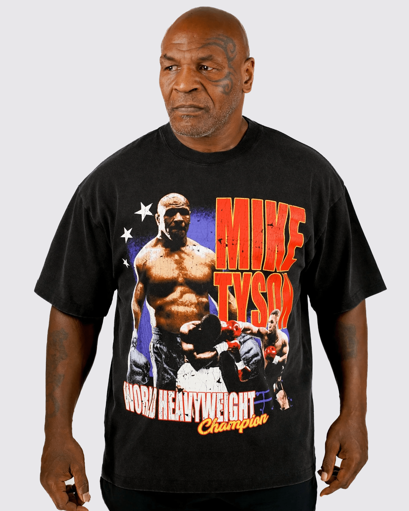 Mike wearing the MT Stars and Strikes shirt.