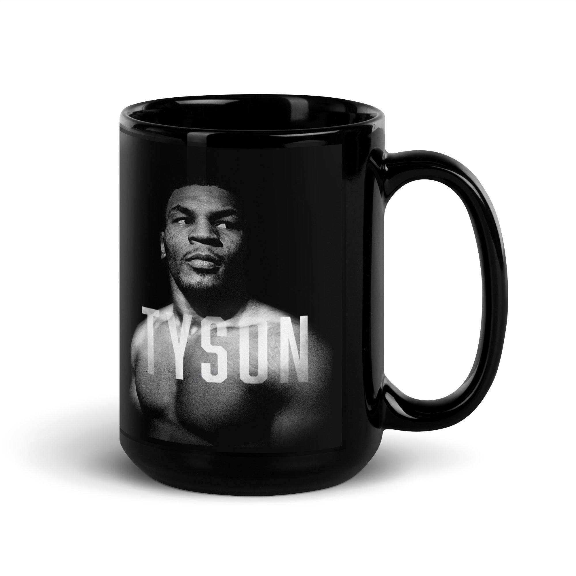 Black Mug with a black and white portrait of Mike. His body is turned slightly to the left, his face is forward and his eyes are looking off to the right. Slightly transparent white text saying "Tyson" is featured across his upper chest.