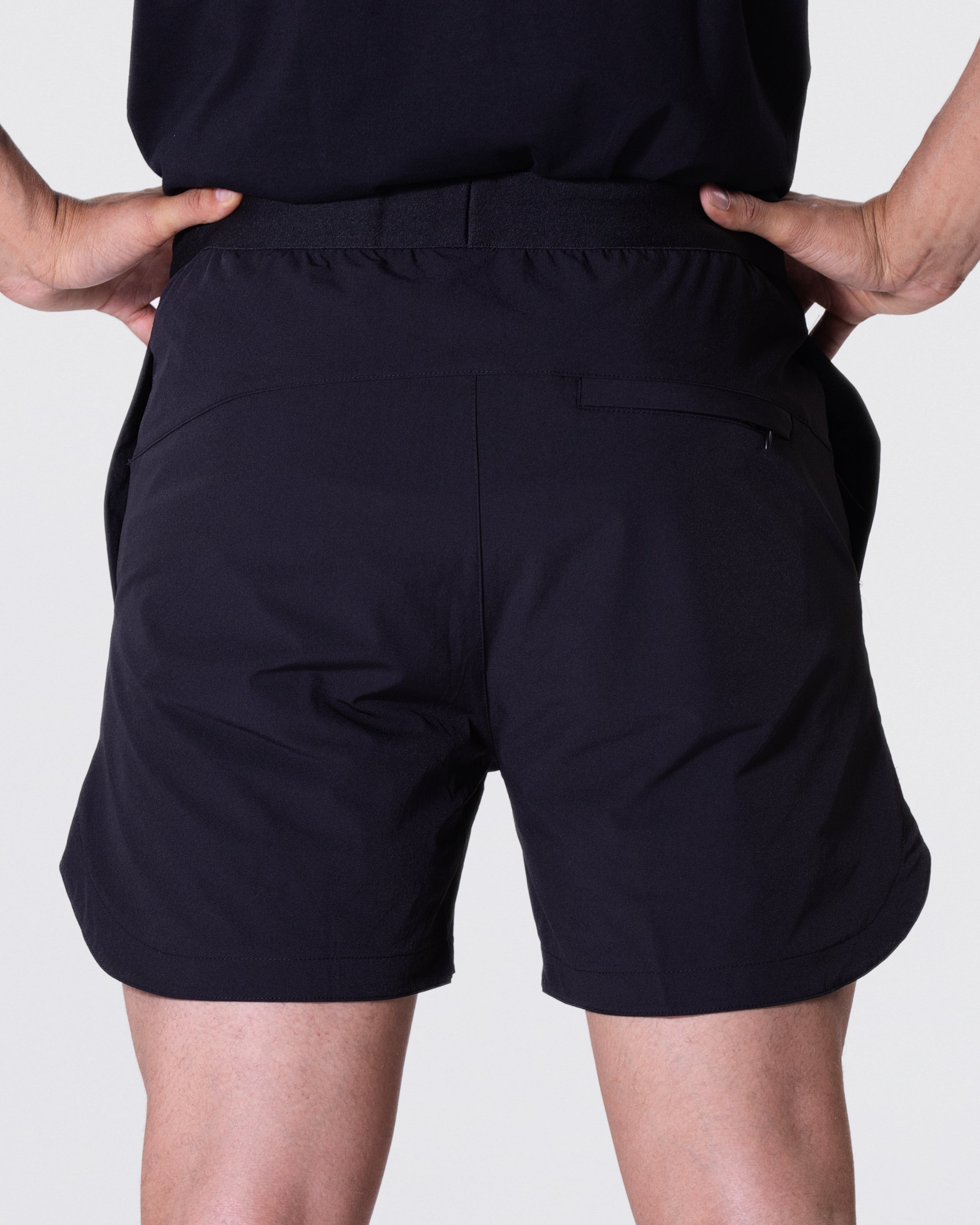 Model showing the back of the Tyson Pro Performance Shorts.