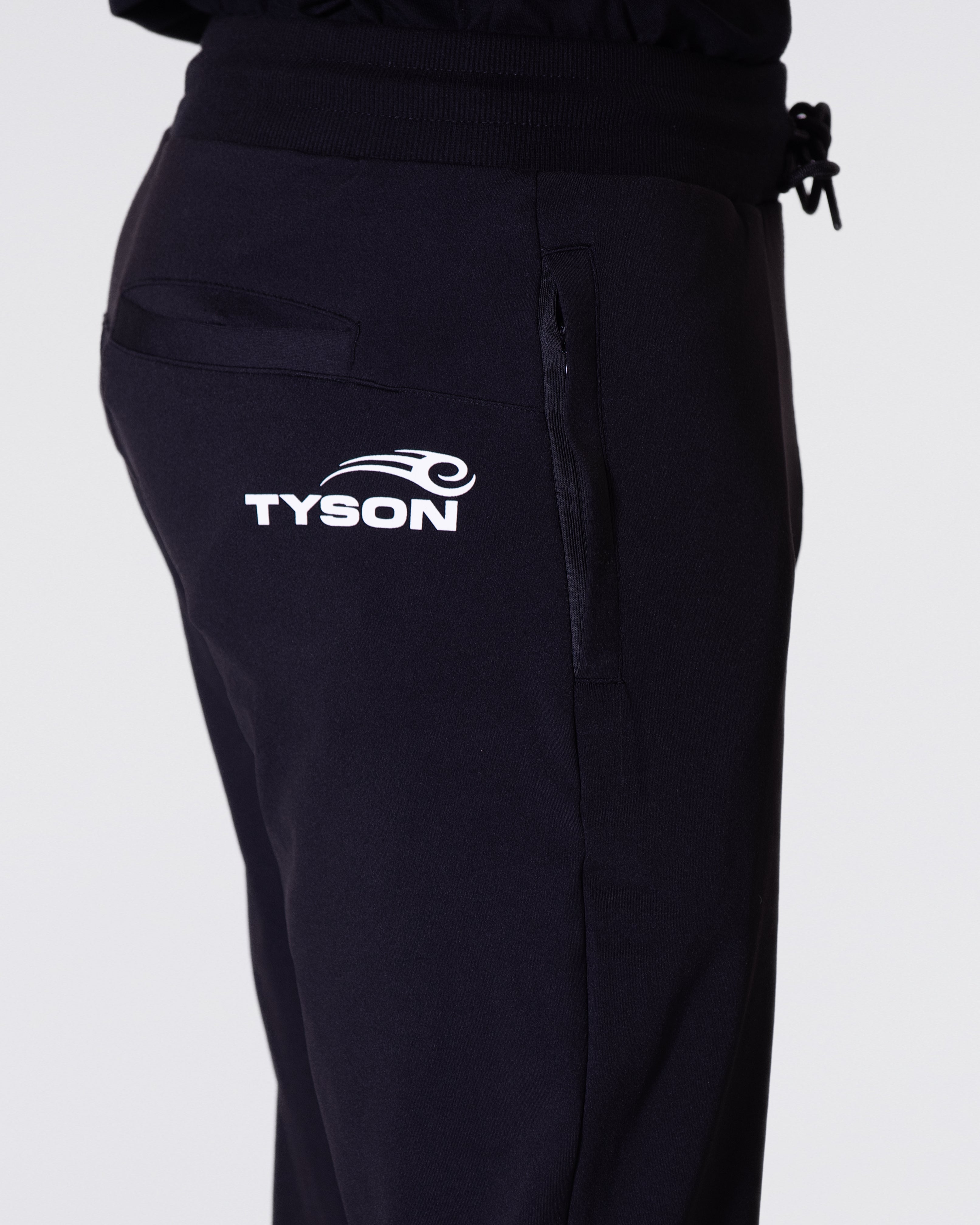 Black jogger featuring the Tyson Pro logo in white on the right hip, just behind the seam.