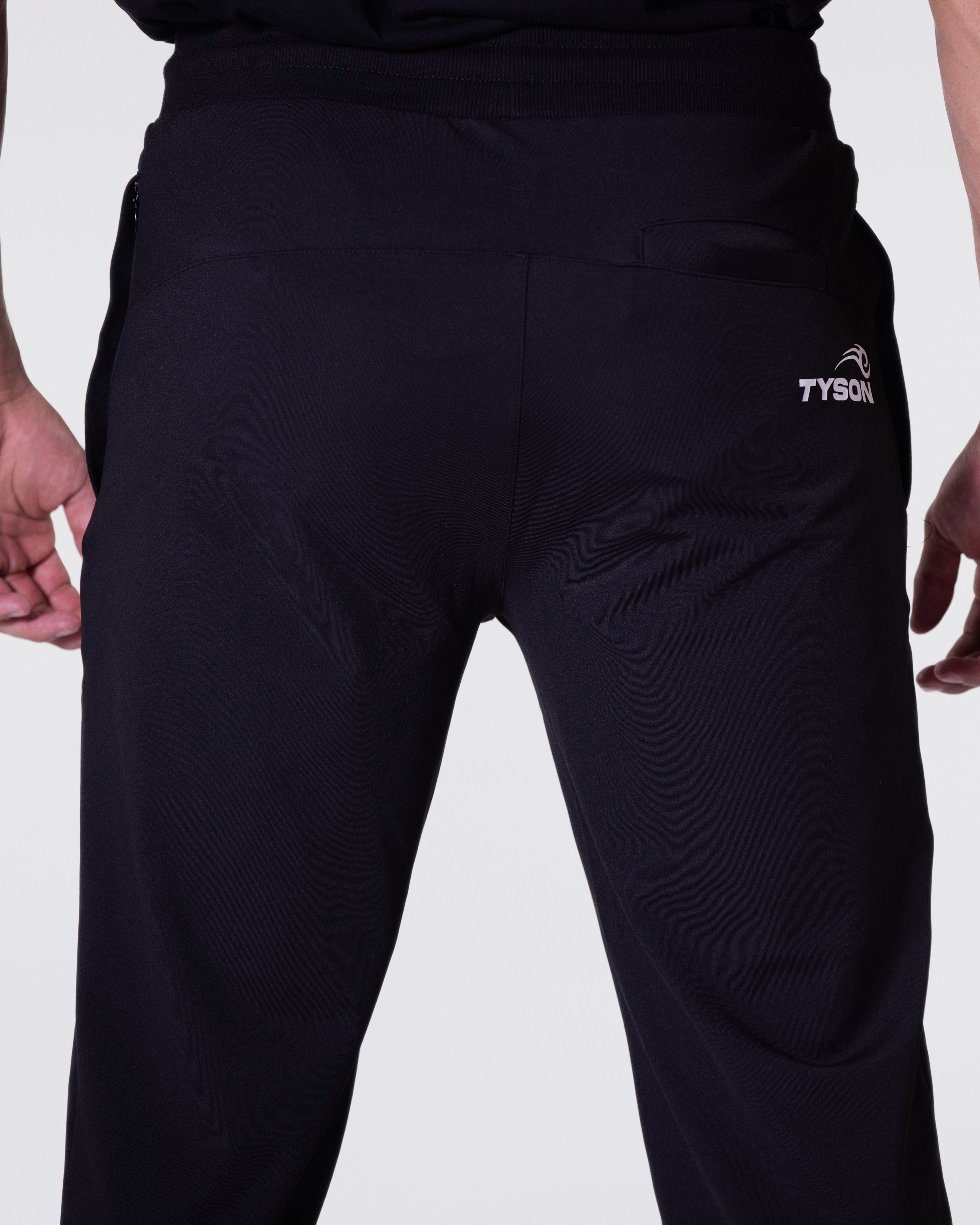 Black jogger featuring the Tyson Pro logo in white on the right hip, just behind the seam.