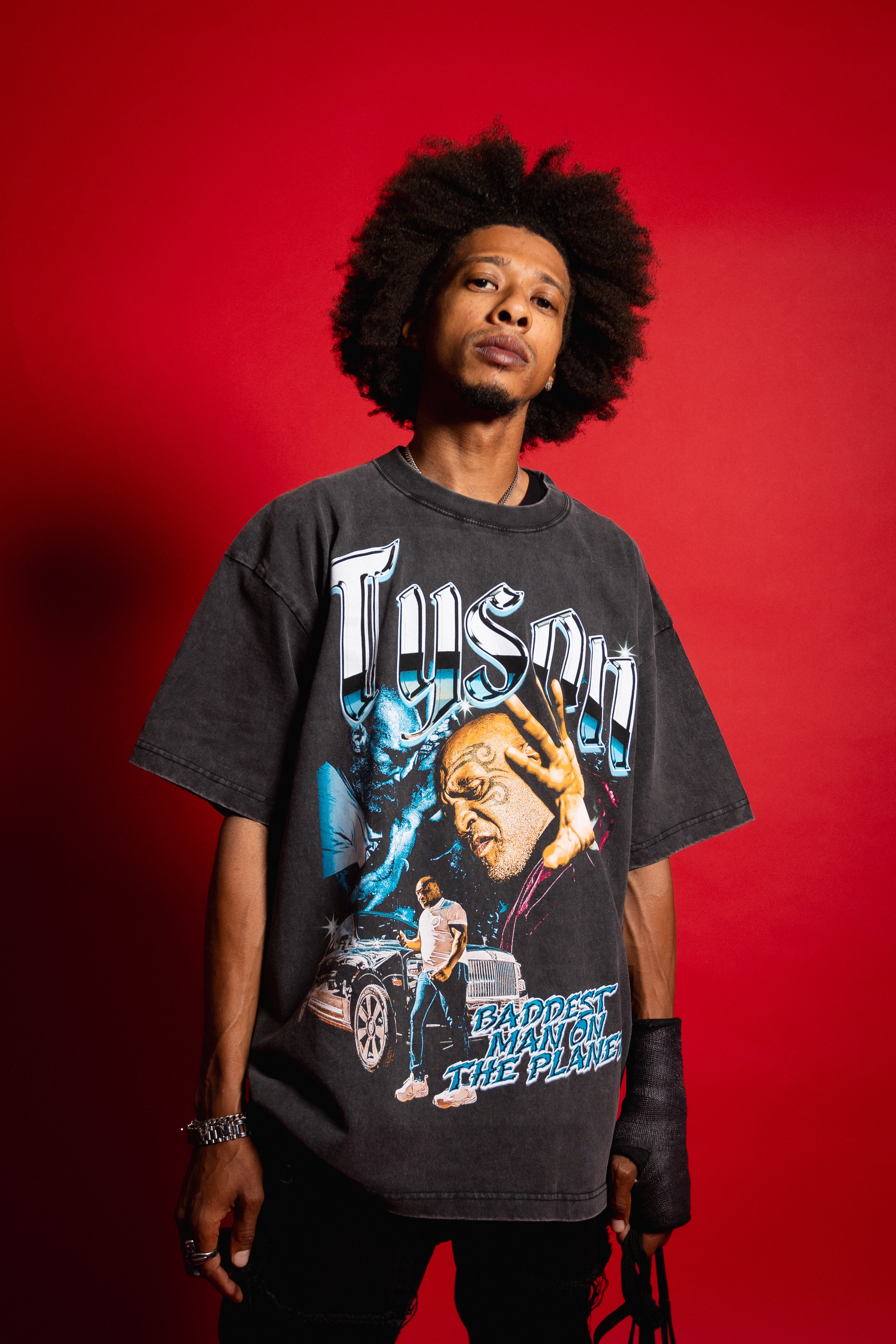 Model wearing Baddest Man on the Planet tee.