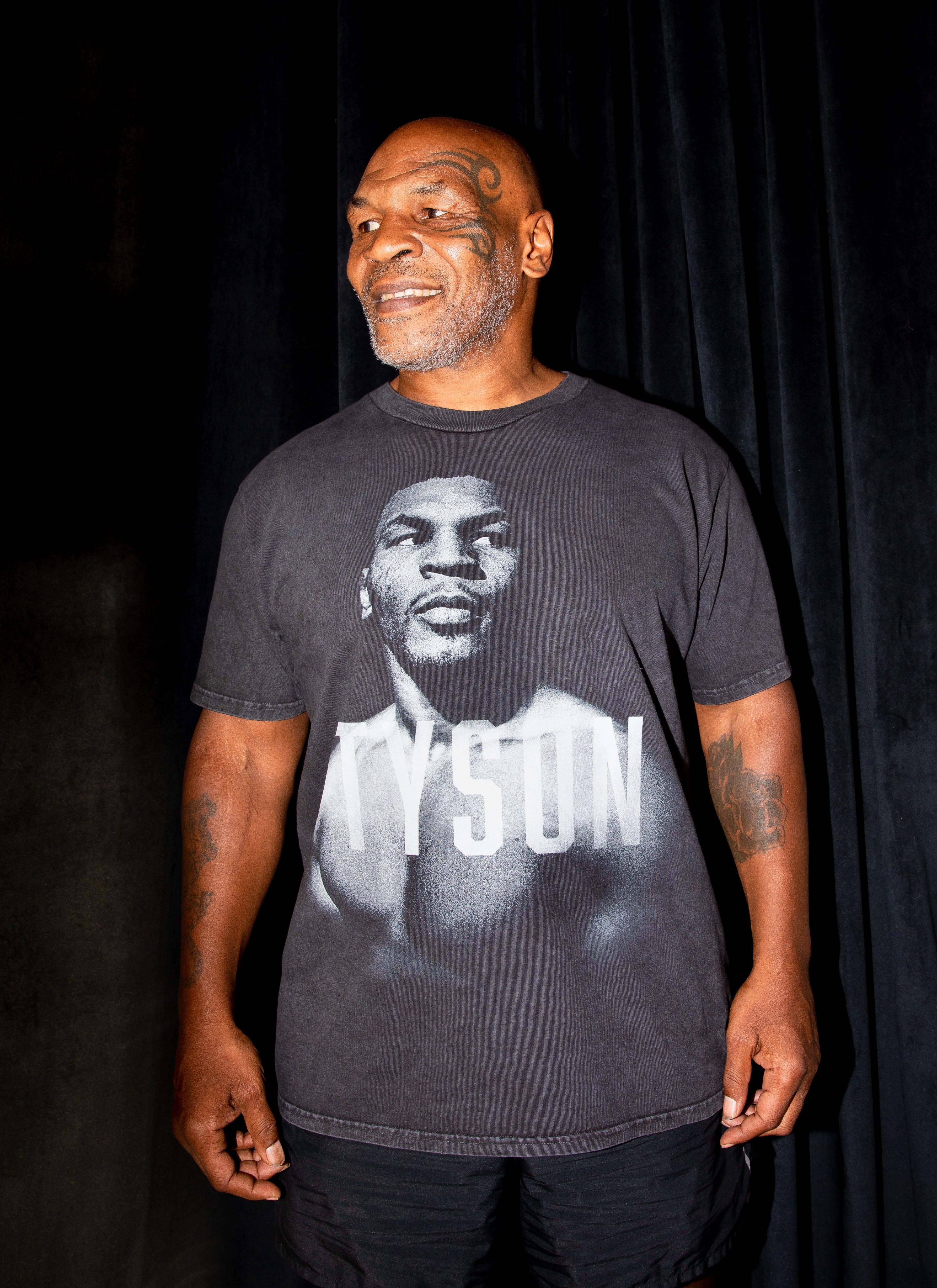 Mike Tyson wearing the Tyson Portrait Snow Wash tee.
