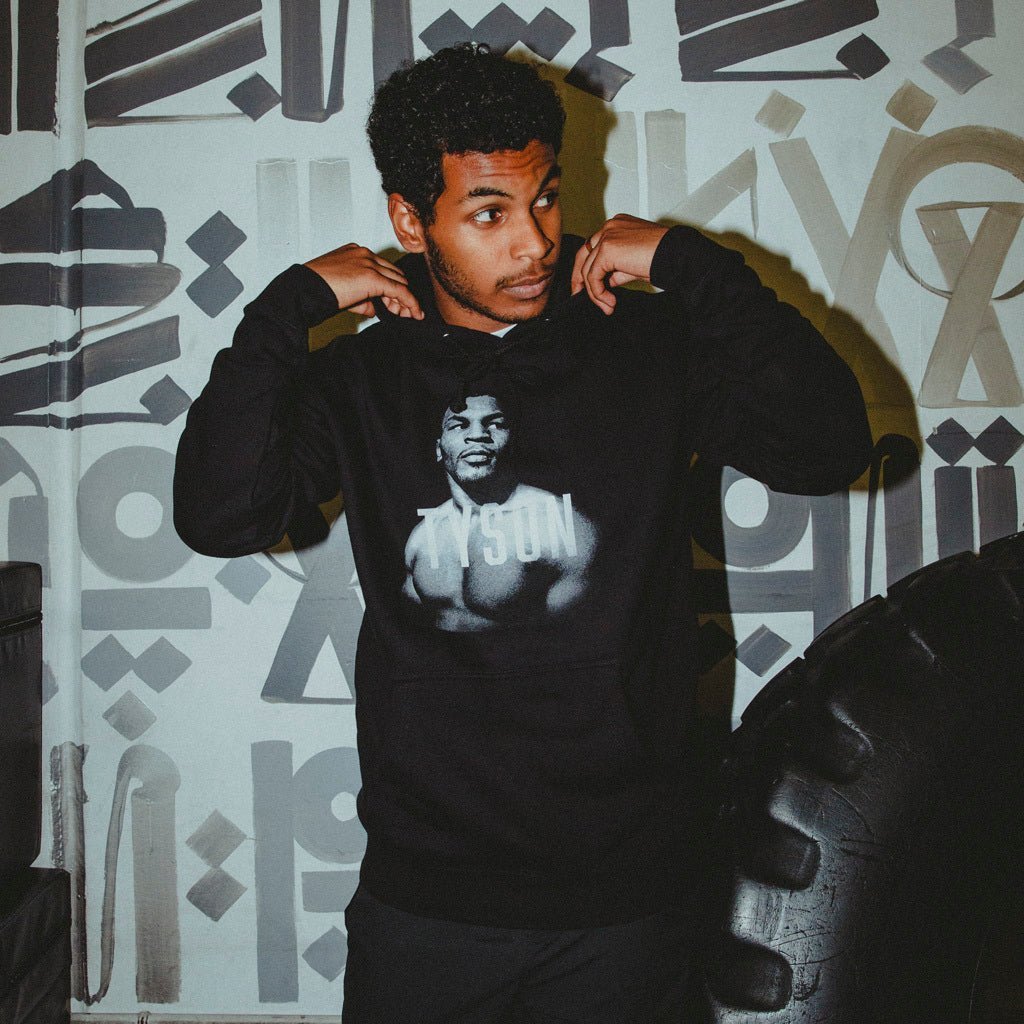 Model wearing the Tyson Portrait hoodie.