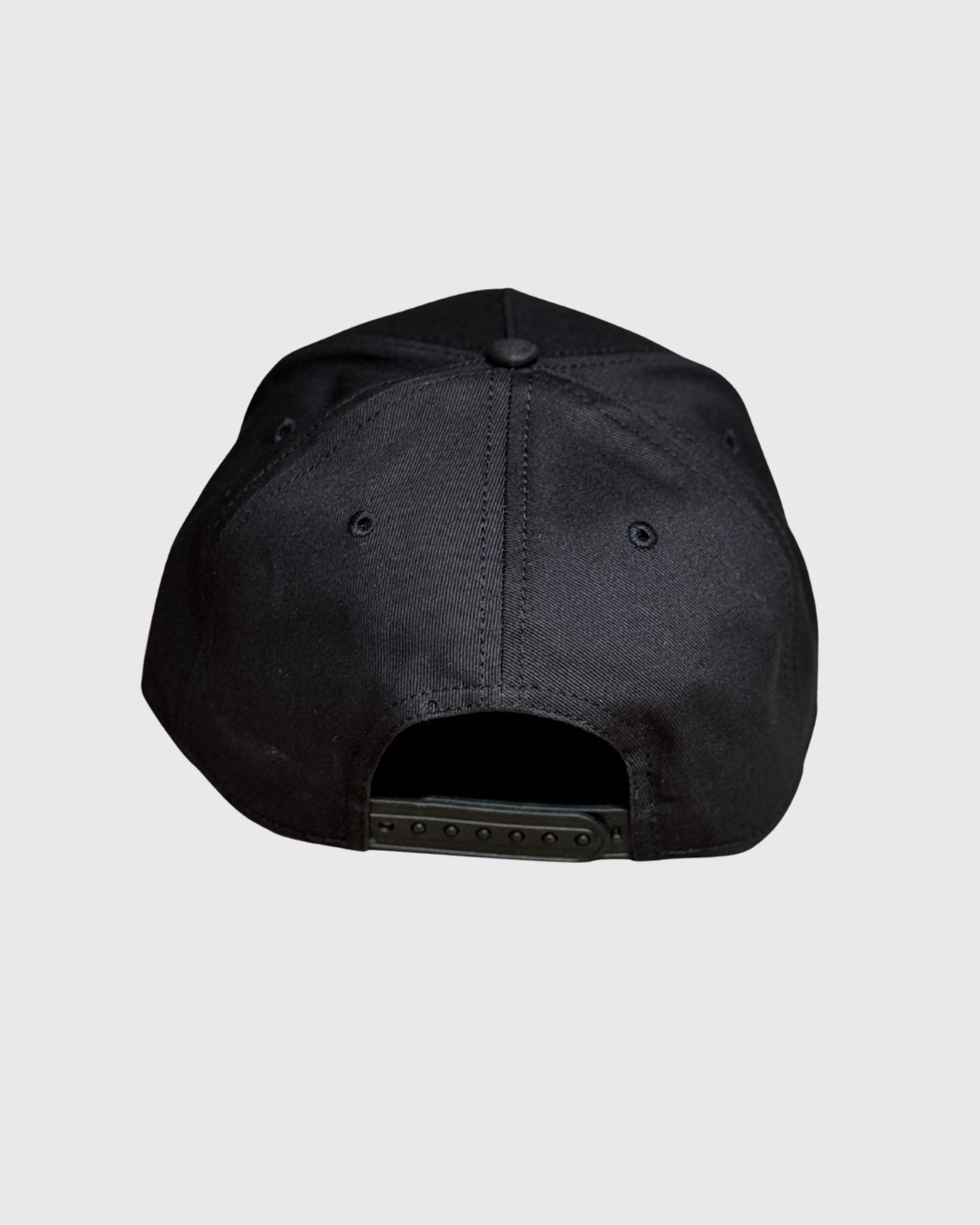 A black hat with the Mike Tyson Invitational Logo on the front panel.
