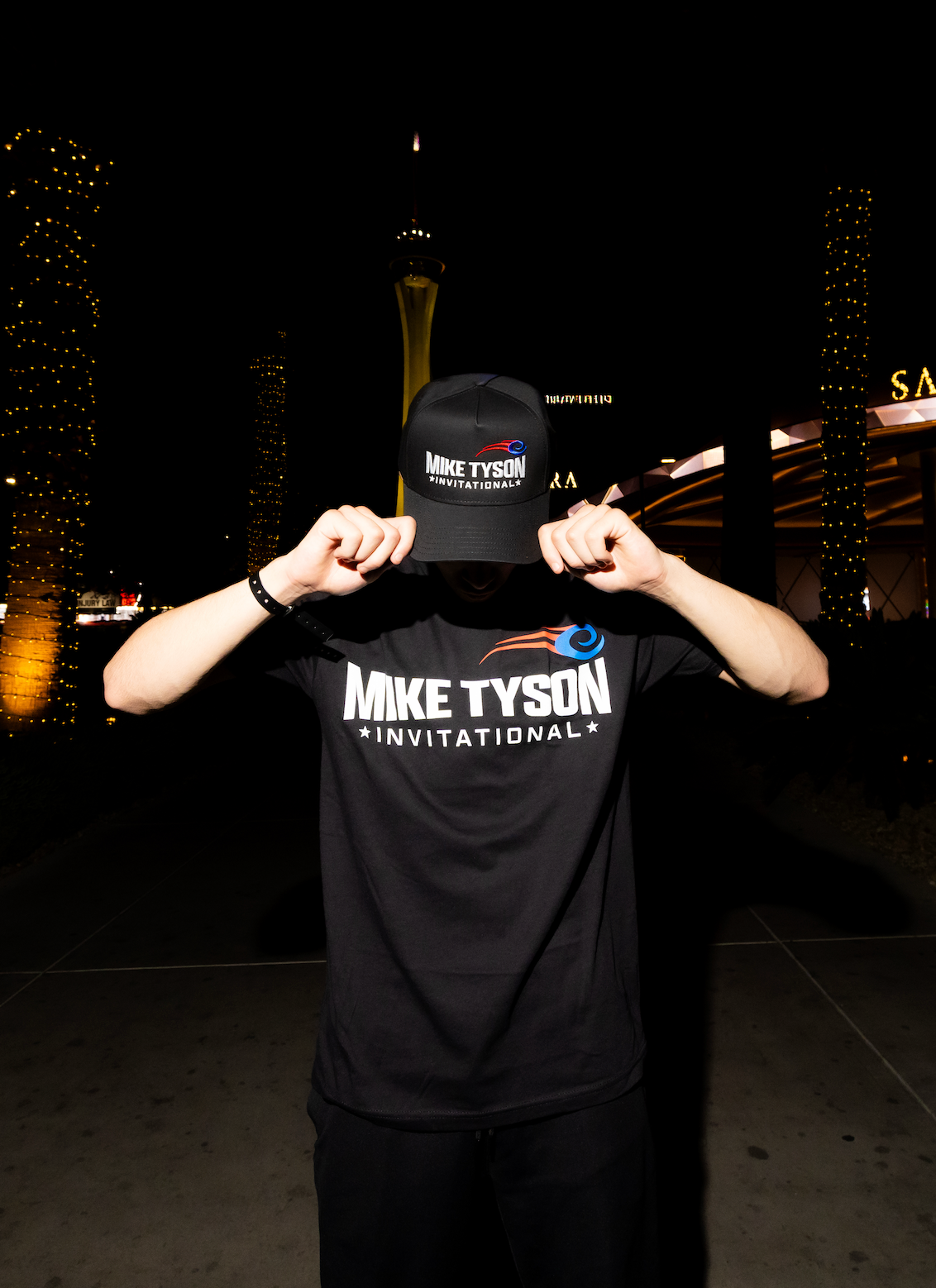 Model wearing the MTI hat and shirt