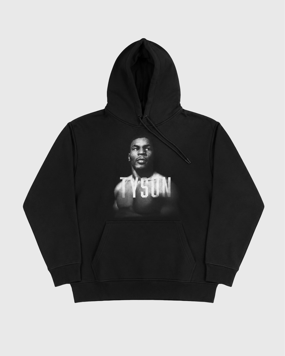 Black hoodie with a black and white portrait of Mike. His body is turned slightly to the left, his face is forward and his eyes are looking off to the right. Slightly transparent white text saying Tyson is featured across his upper chest.
