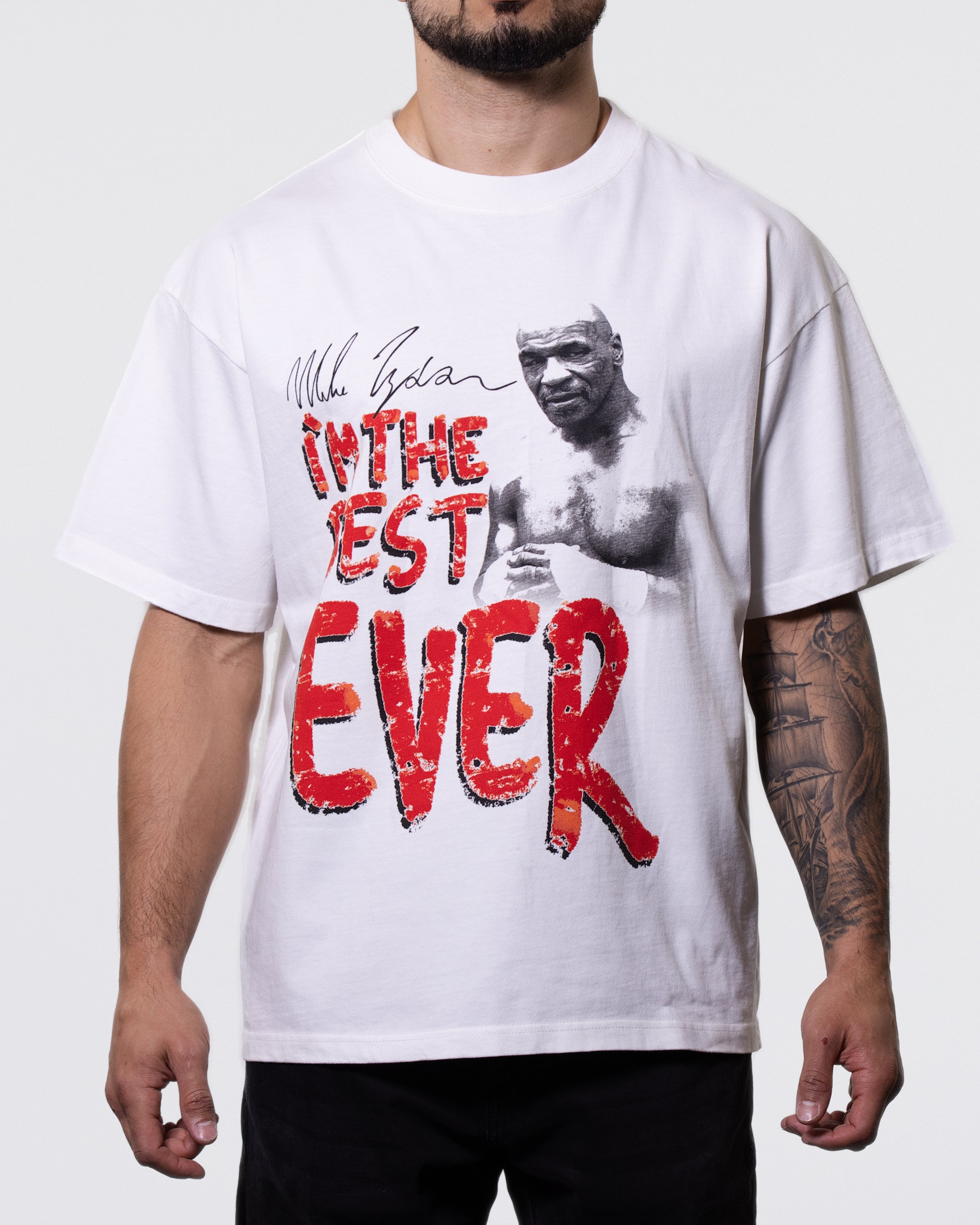 White T-shirt. The front has a black and white image of Mike Tyson in the upper right corner, looking towards the viewer. Text in the main body of the graphic says "I'm the Best Ever." The text on the back says "I'm the Most Brutal and Vicious."