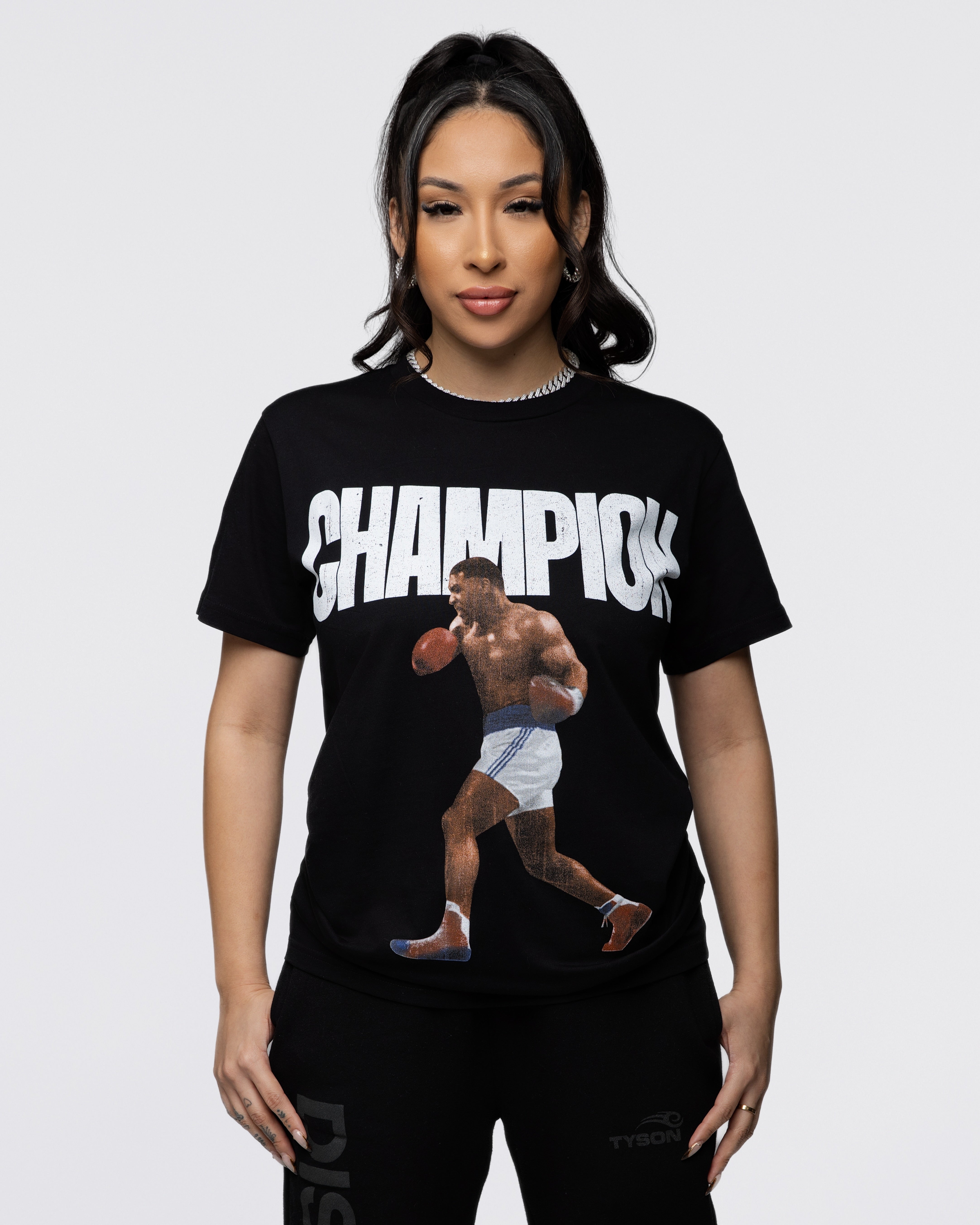 This black shirt features the text "champion" with an image of Mike about to throw a punch.