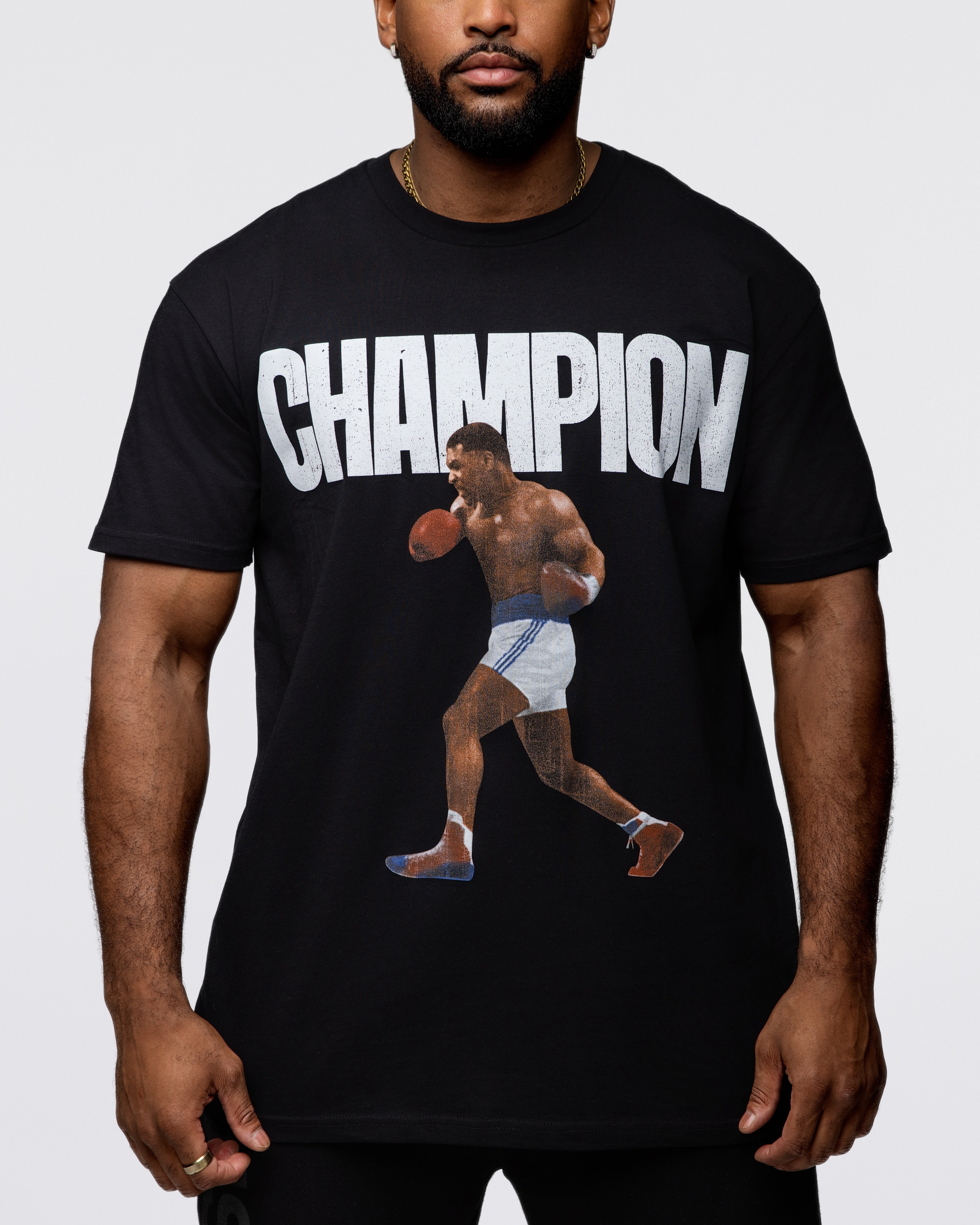 This black shirt features the text "champion" with an image of Mike about to throw a punch. 