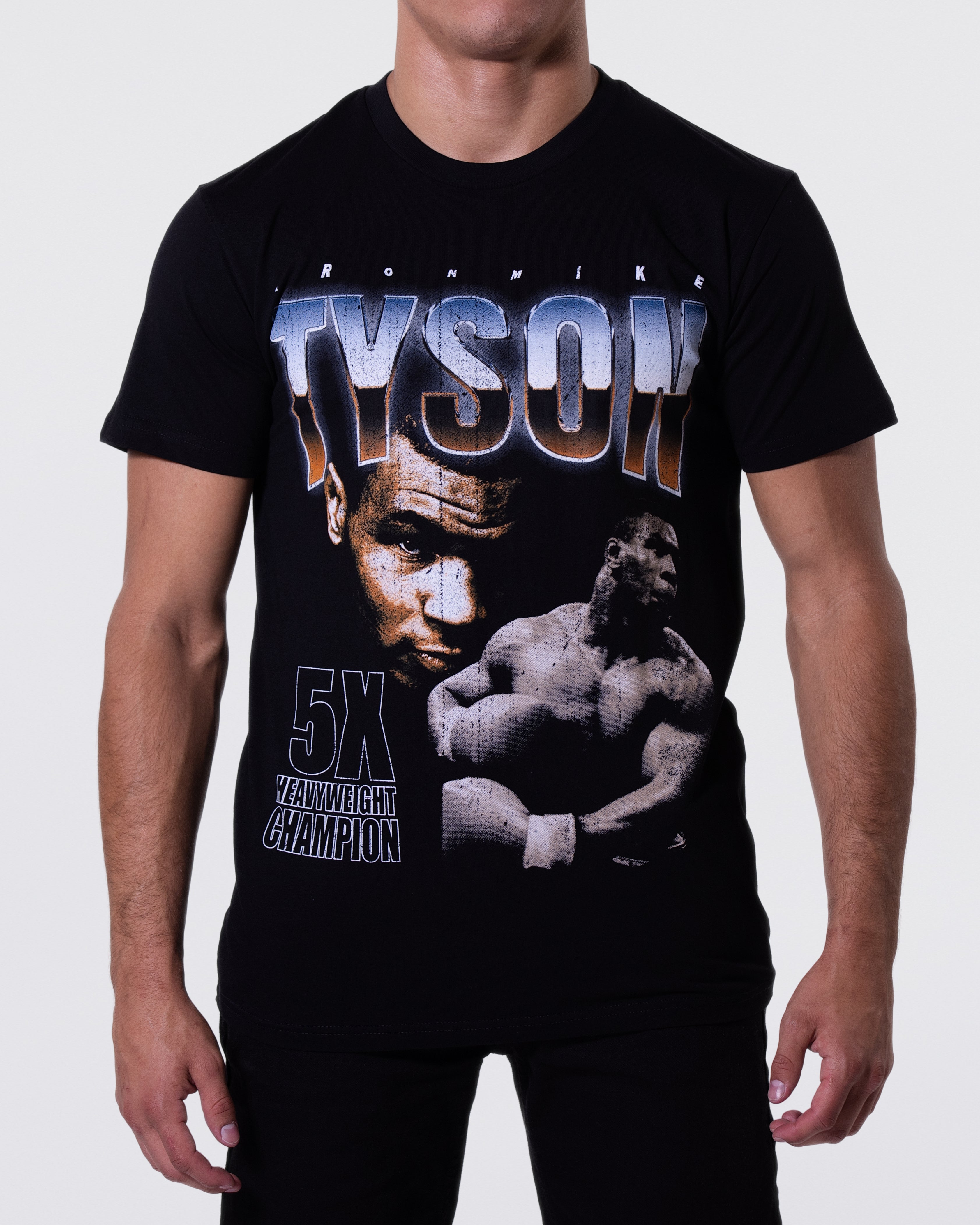 Black T-shirt with 2 images of Mike Tyson: One portrait and the other mid-punch. "Tyson" is written across the top.