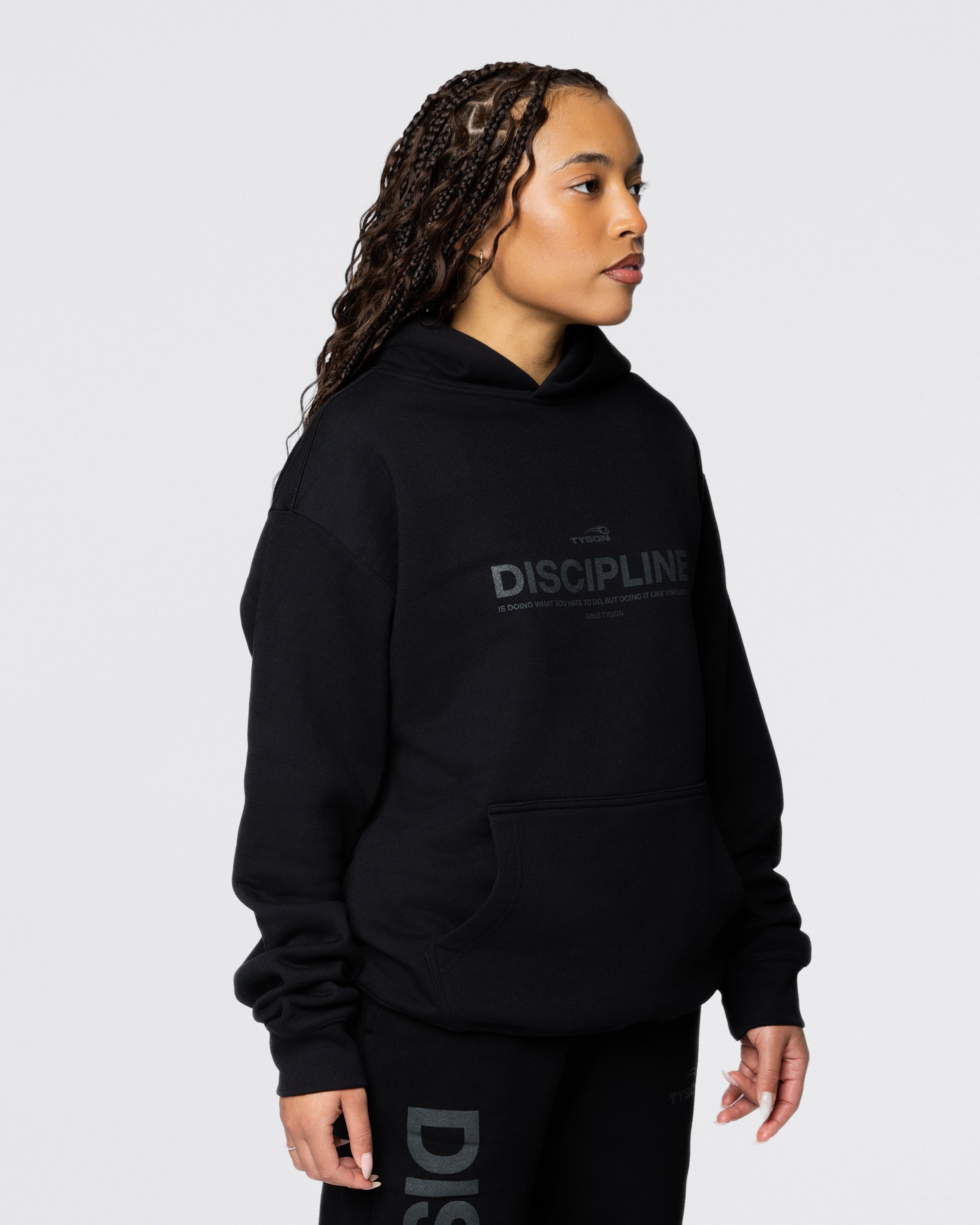 Model wearing the Discipline Hoodie.