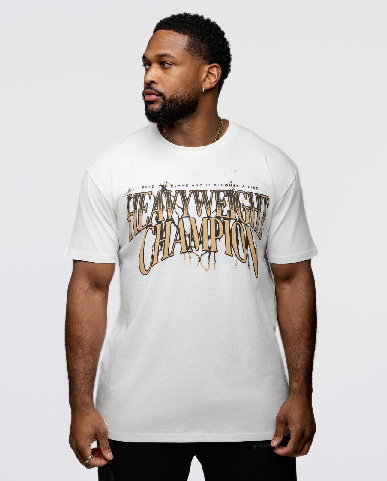 Model wearing the Heavyweight Champion tee.