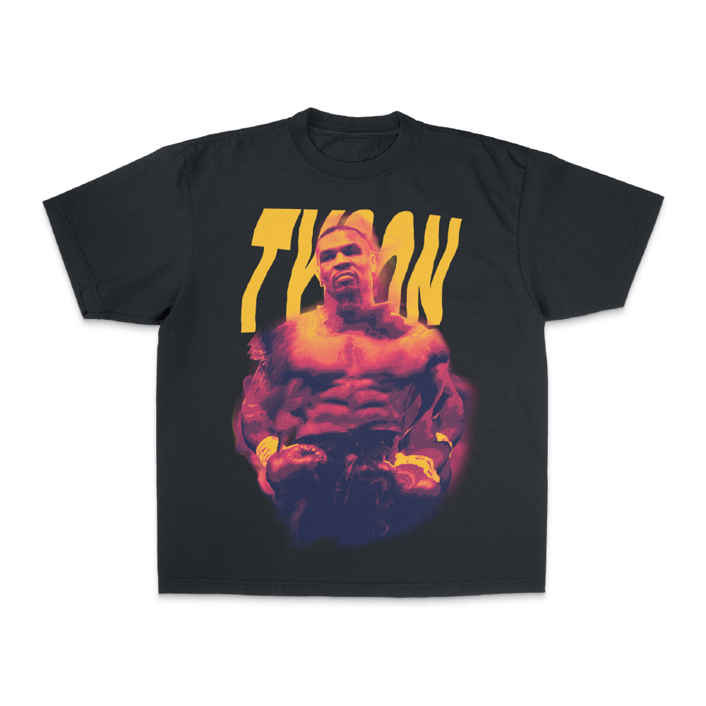 Black T-shirt with a fierce image of Mike, ready to fight. The image has red and blue highlights reminiscent of a mirage in the desert. "Tyson" is written behind the image. 