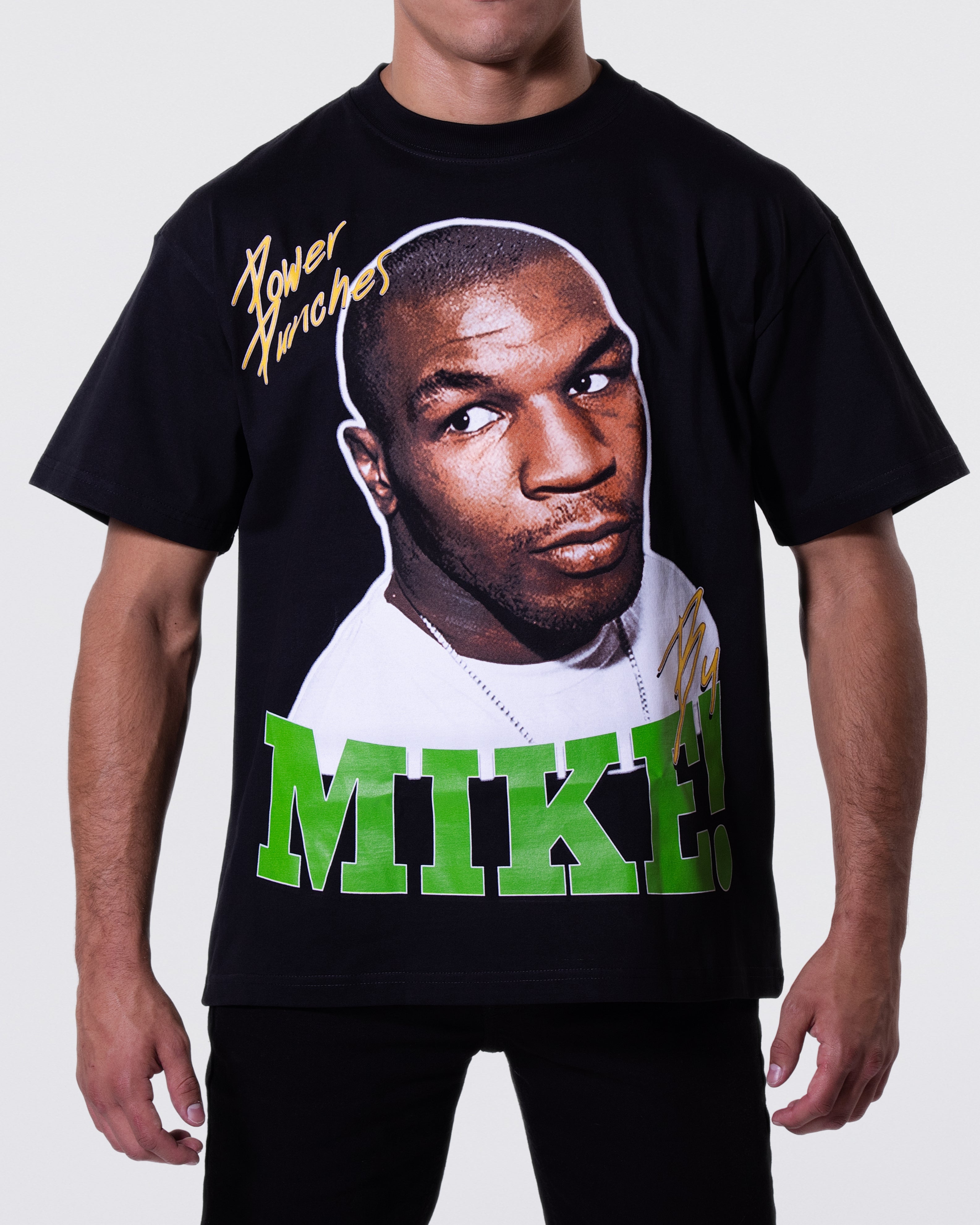 Black T-shirt with an image of a young Mike. The top has small text that says "Power Punches" while the bottom says "Mike!"