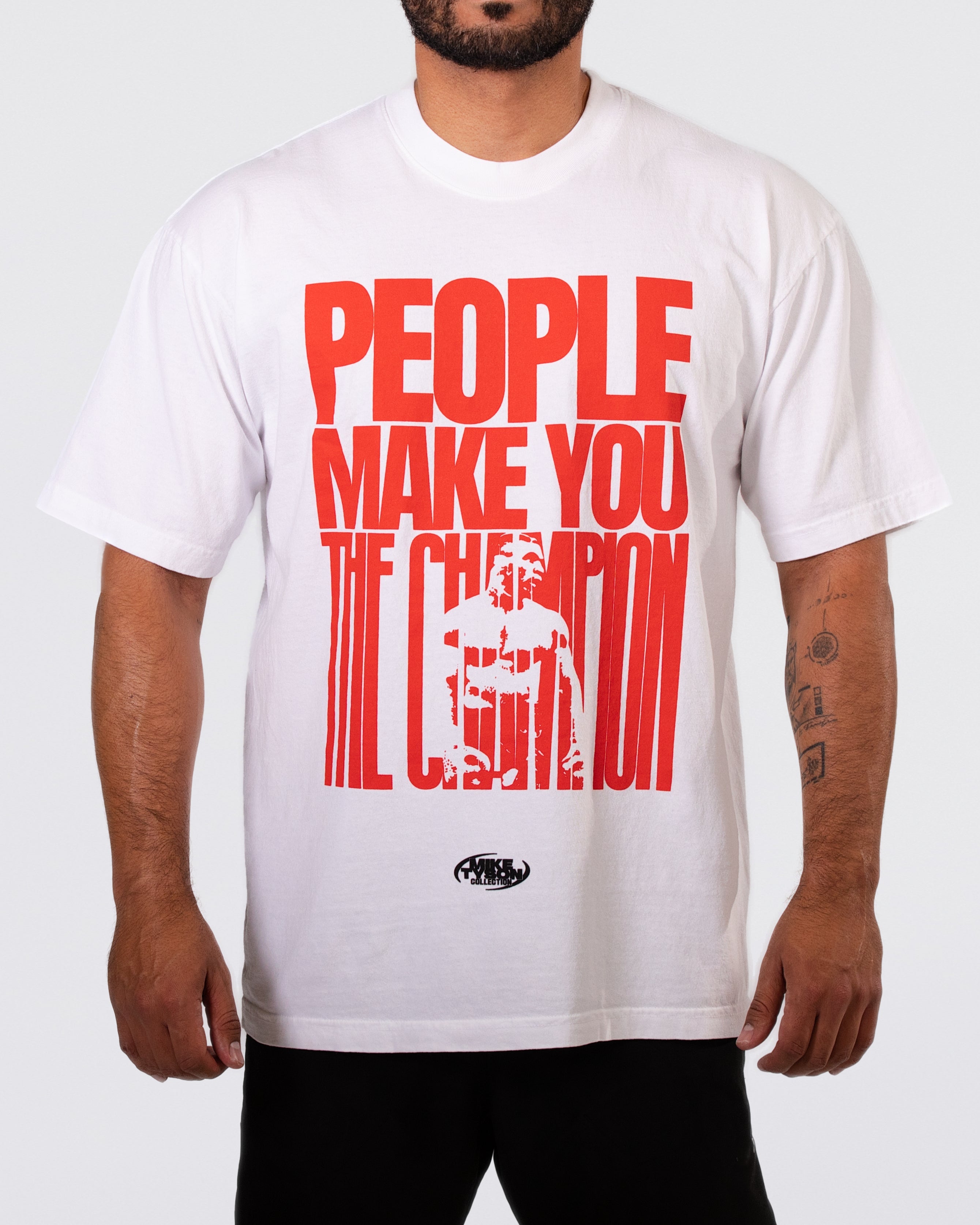 White T-shirt with large red text across the front saying "People Make You the Champion." Within the word "Champion," there is the silhouette of Mike in his boxing gear.