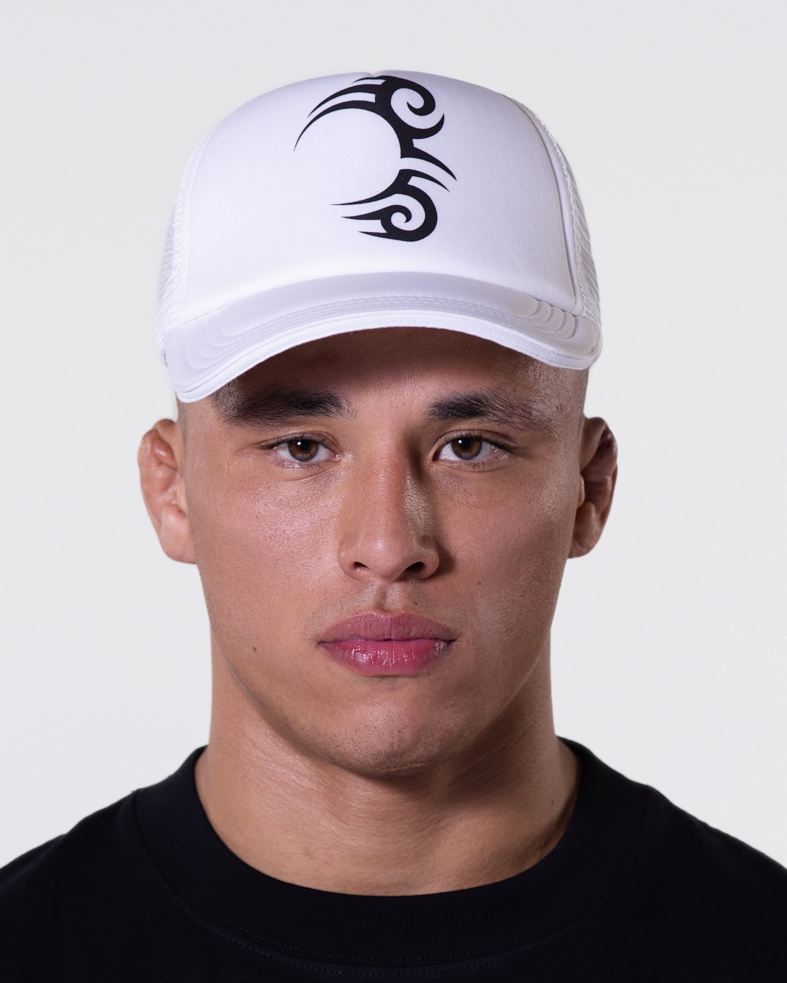 White trucker hat with Mike's face tattoo represented in black on the front panel.