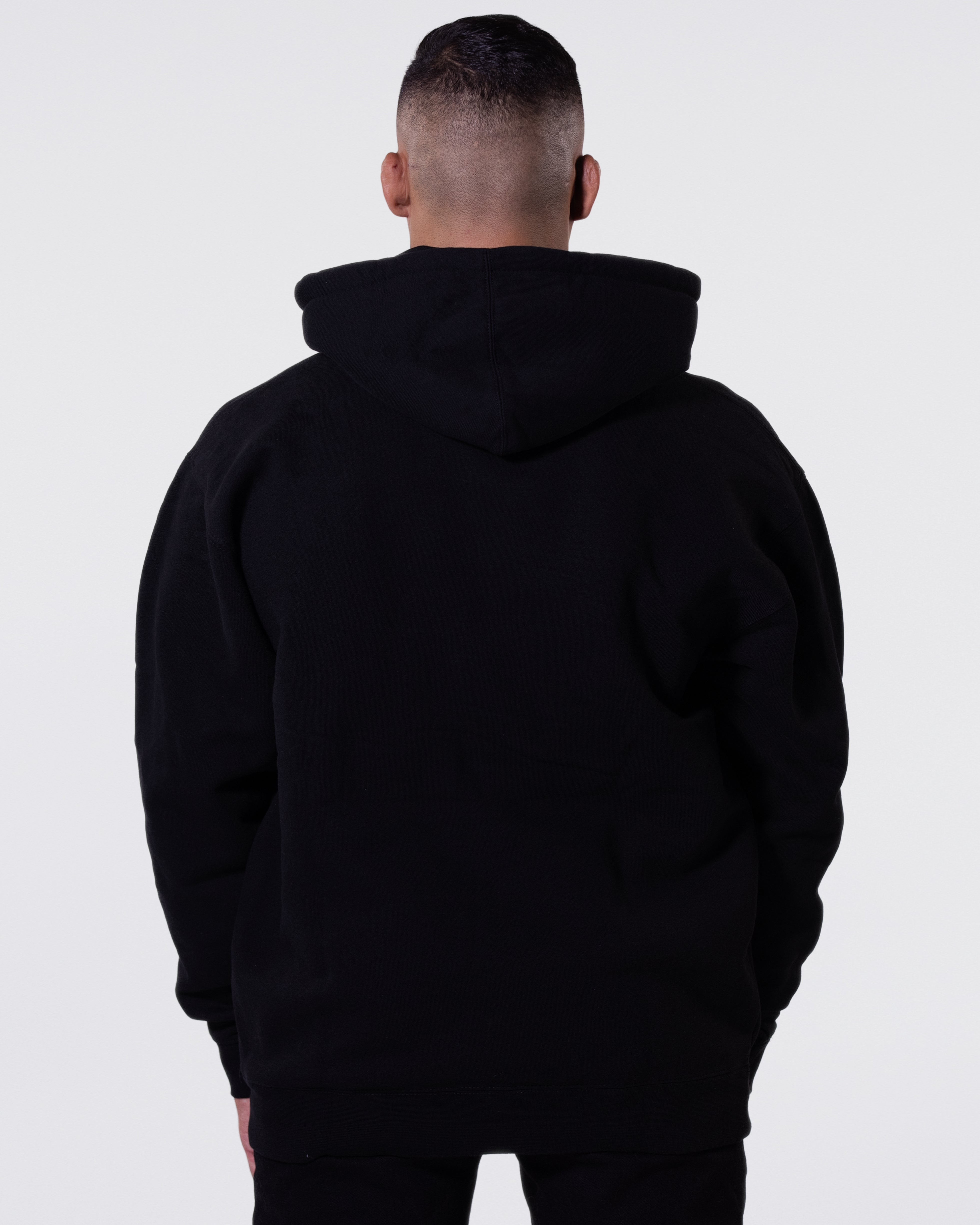 Model showing the back of the Tyson Portrait Hoodie.