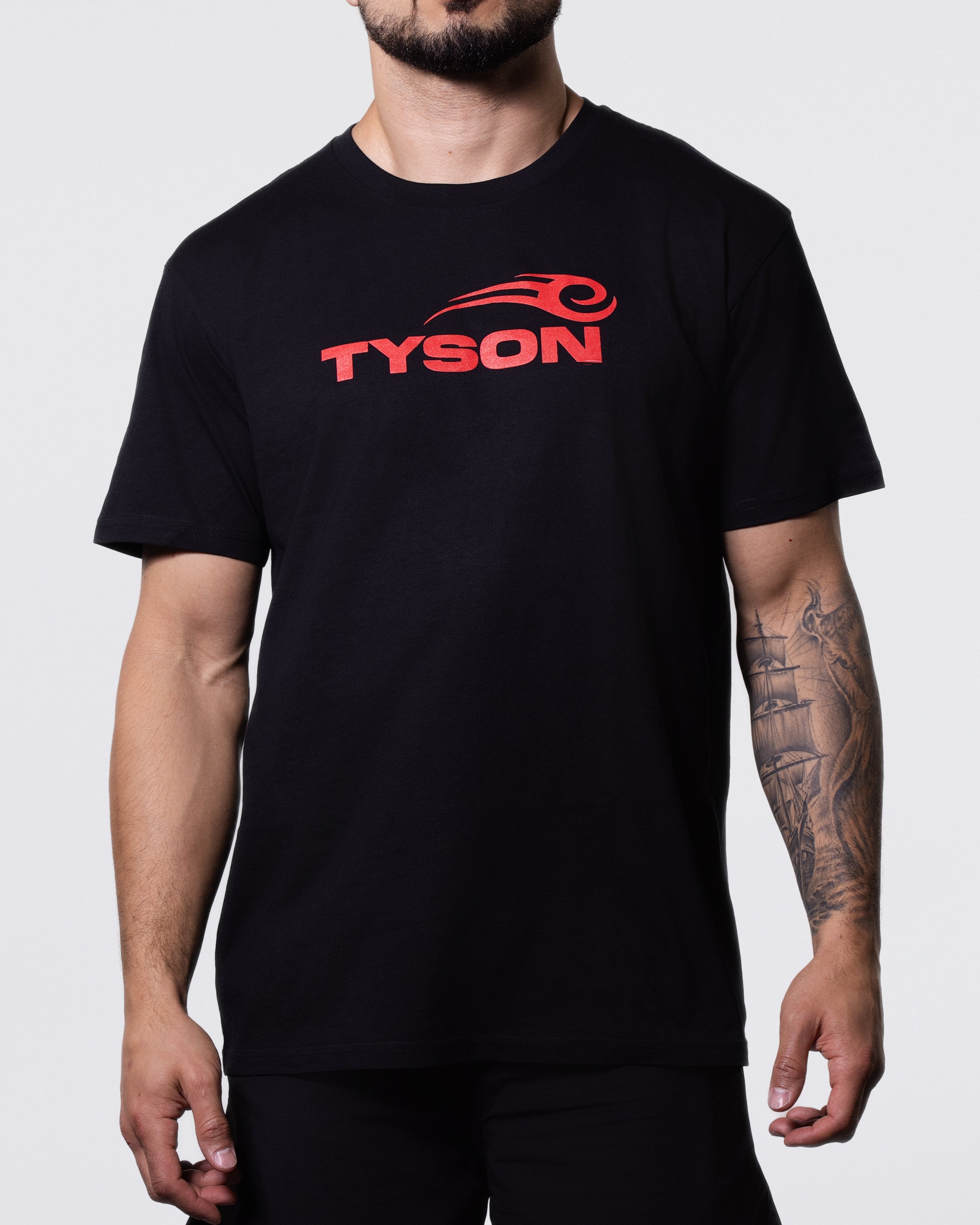 Black T-shirt prominently featuring the Tyson Pro logo in red across the chest.