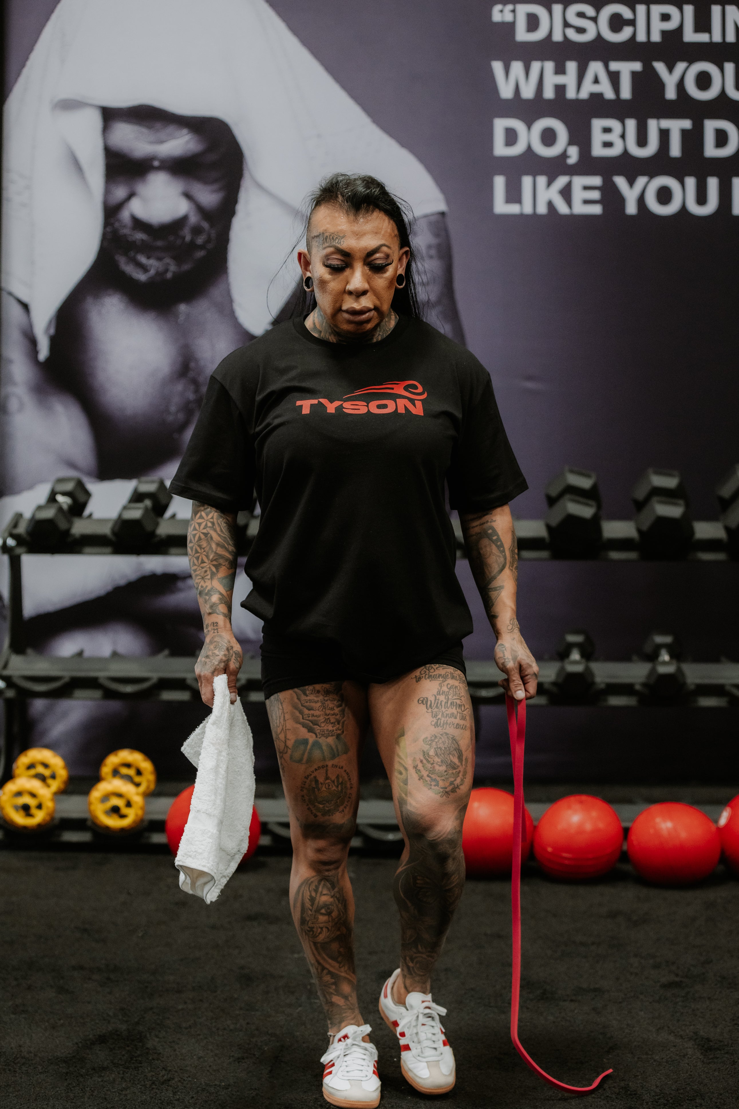 Model wearing the Tyson Pro Cotton Shirt Black with Red Logo.