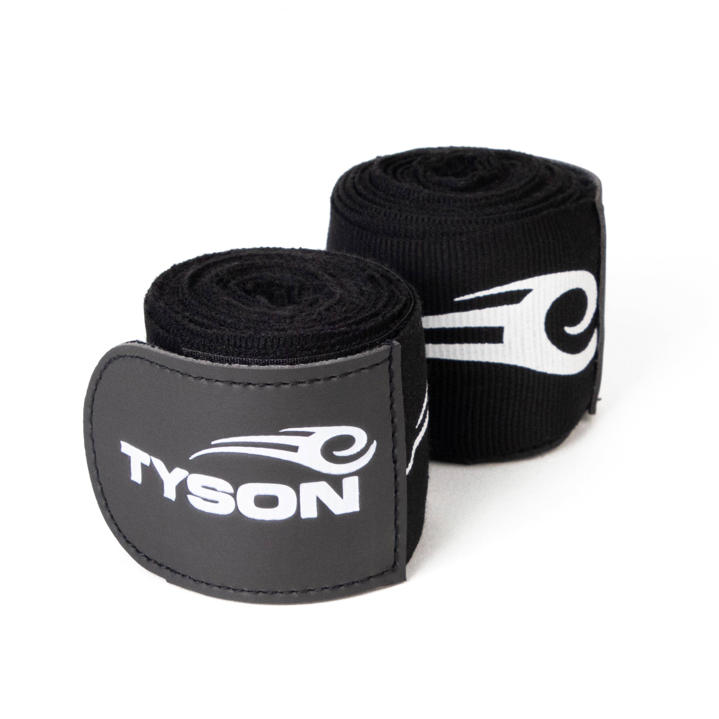 Black hand wraps with the Tyson Pro logo in white on the strap, and the Tyson half tribal logo repeatedly running along the entire wrap. 