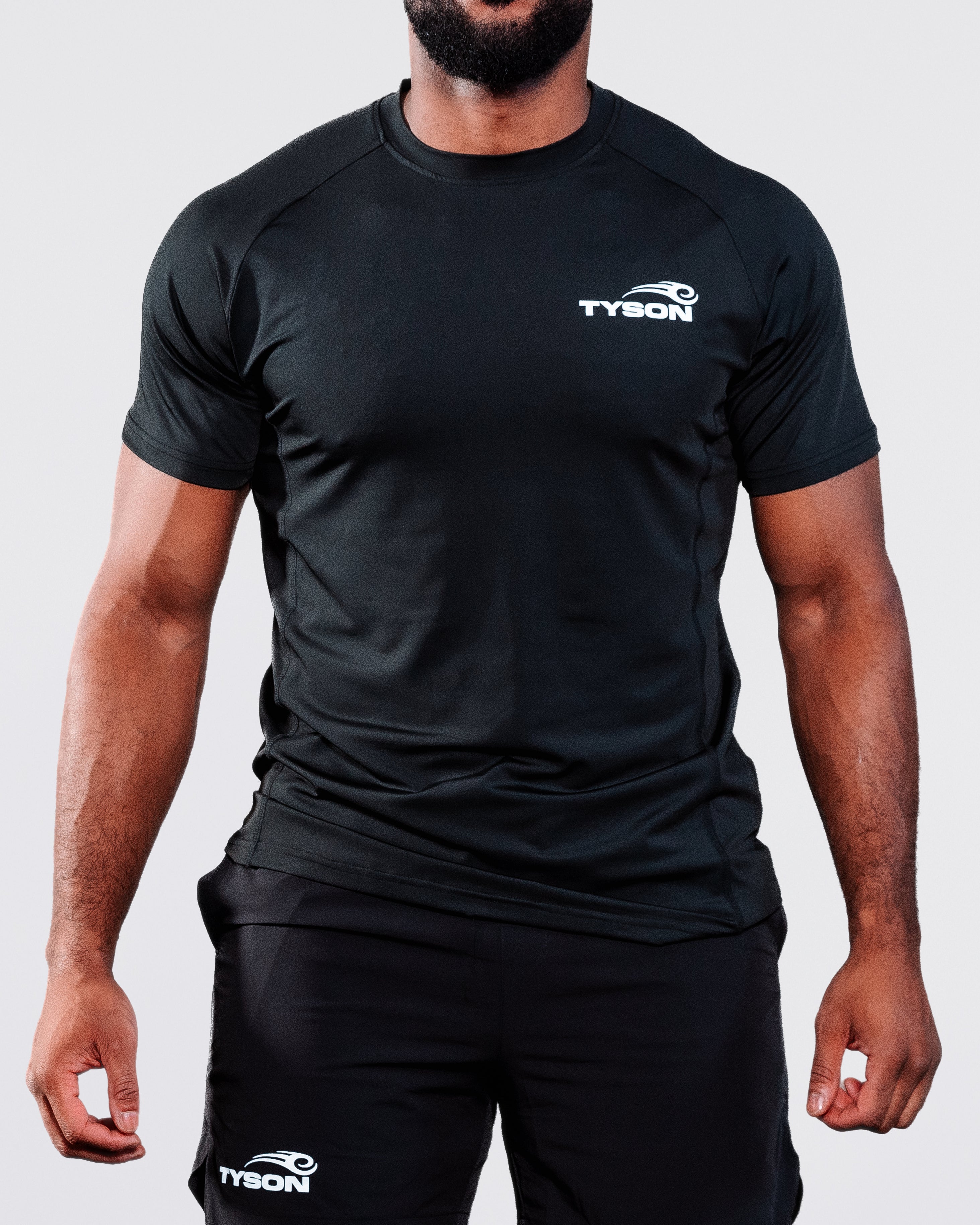 Black T-shirt featuring the Tyson Pro logo in white on the left chest area.