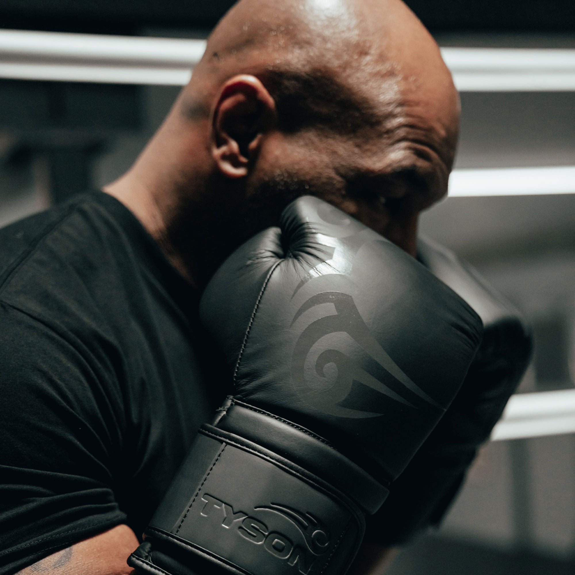 Mike Tyson using the Tyson Pro Standard Gloves.