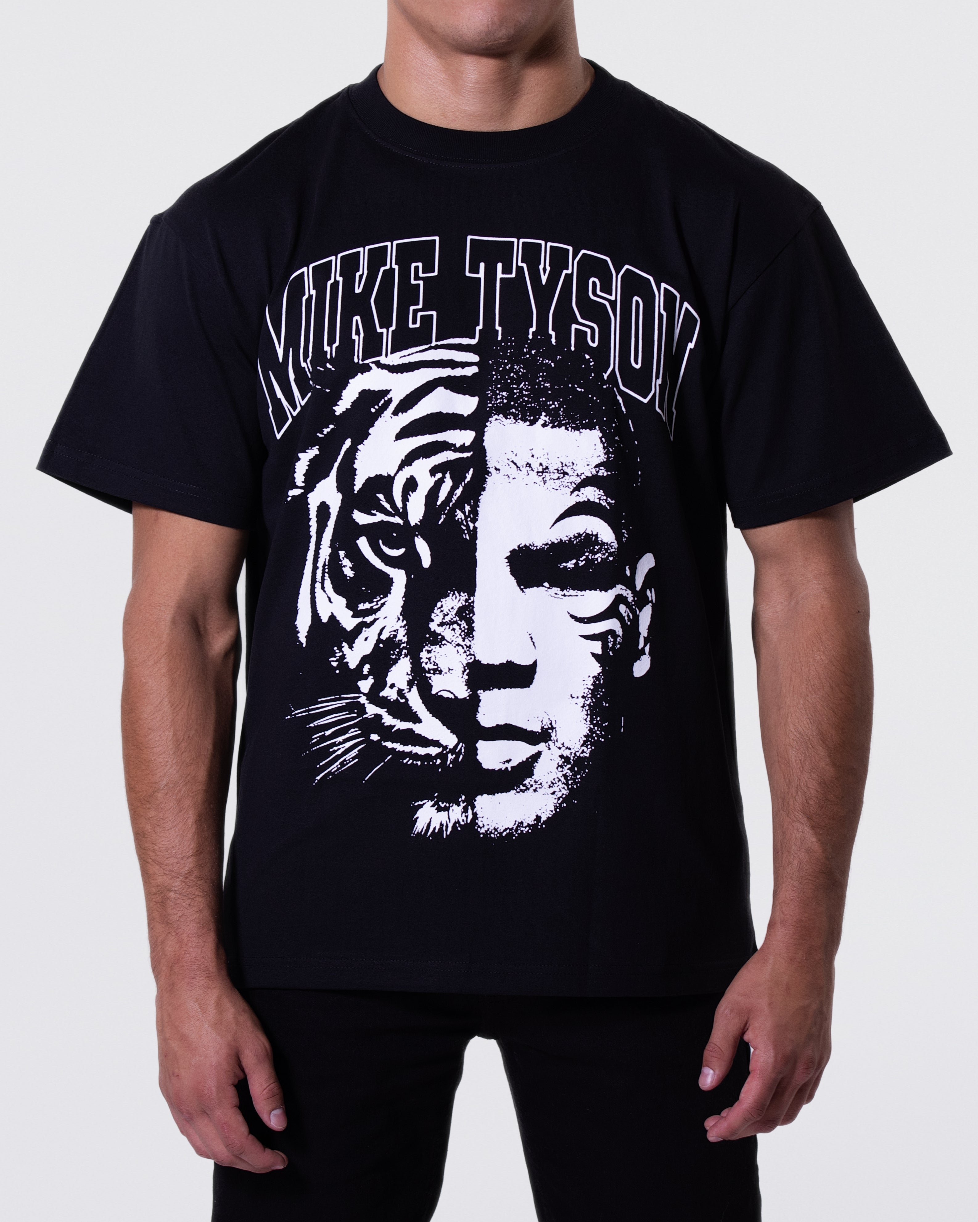 Black T-shirt with a black and white image that is half tiger and half Mike's face. "Mike Tyson" is written across the top.